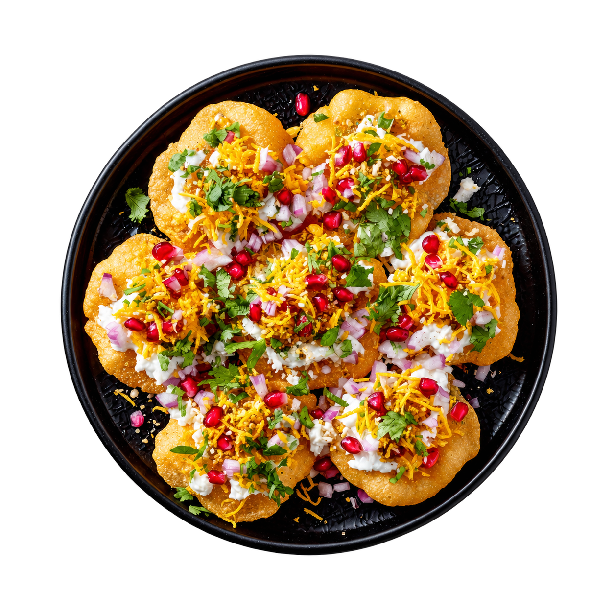 Pani puri shells around a bowl of spiced water